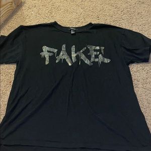“FAKE” tee shirt